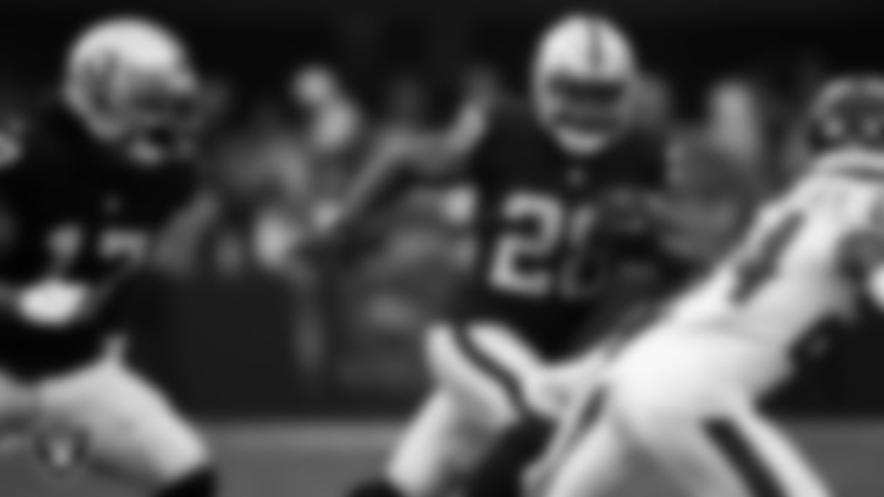 Las Vegas Raiders running back Josh Jacobs (28) rushes during the regular season home game against the Houston Texans at Allegiant Stadium.