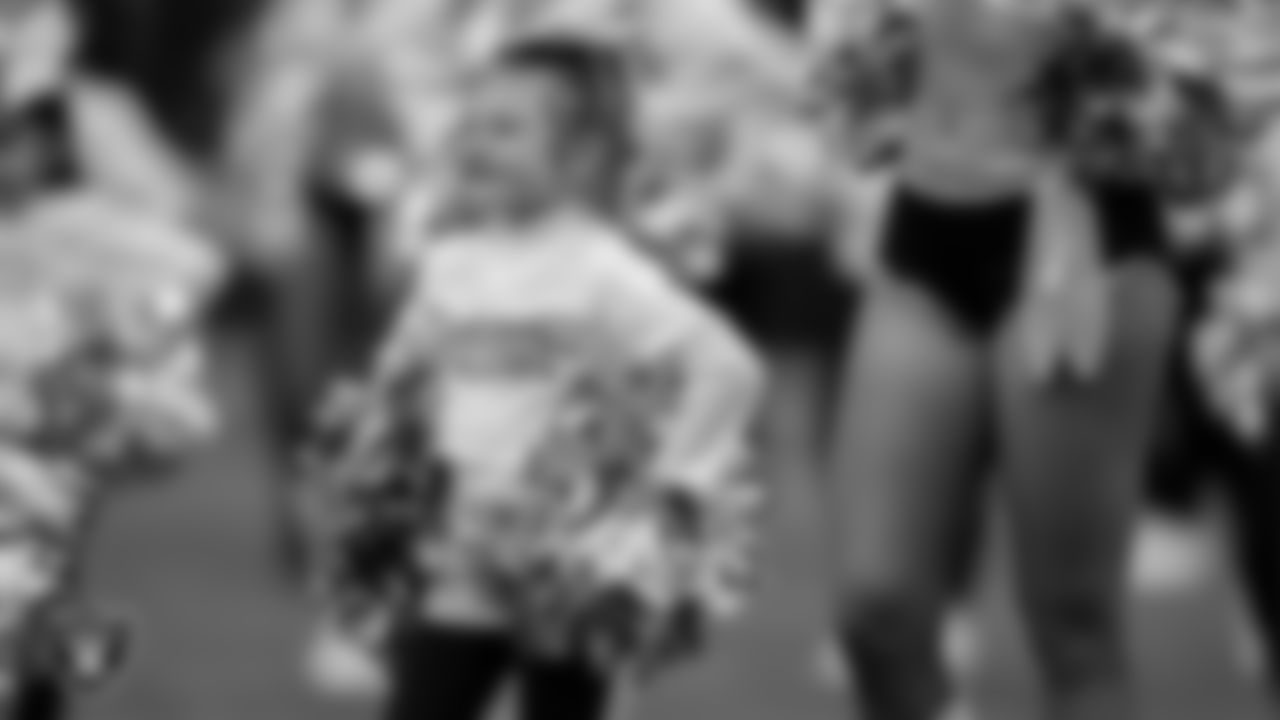 The Raiderettes and Junior Raiderettes perform on the field before the regular season home game against the Los Angeles Chargers at Allegiant Stadium.