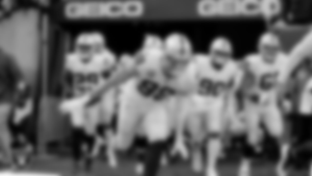 The Las Vegas Raiders are introduced onto the field before their postseason away game against the Cincinnati Bengals.