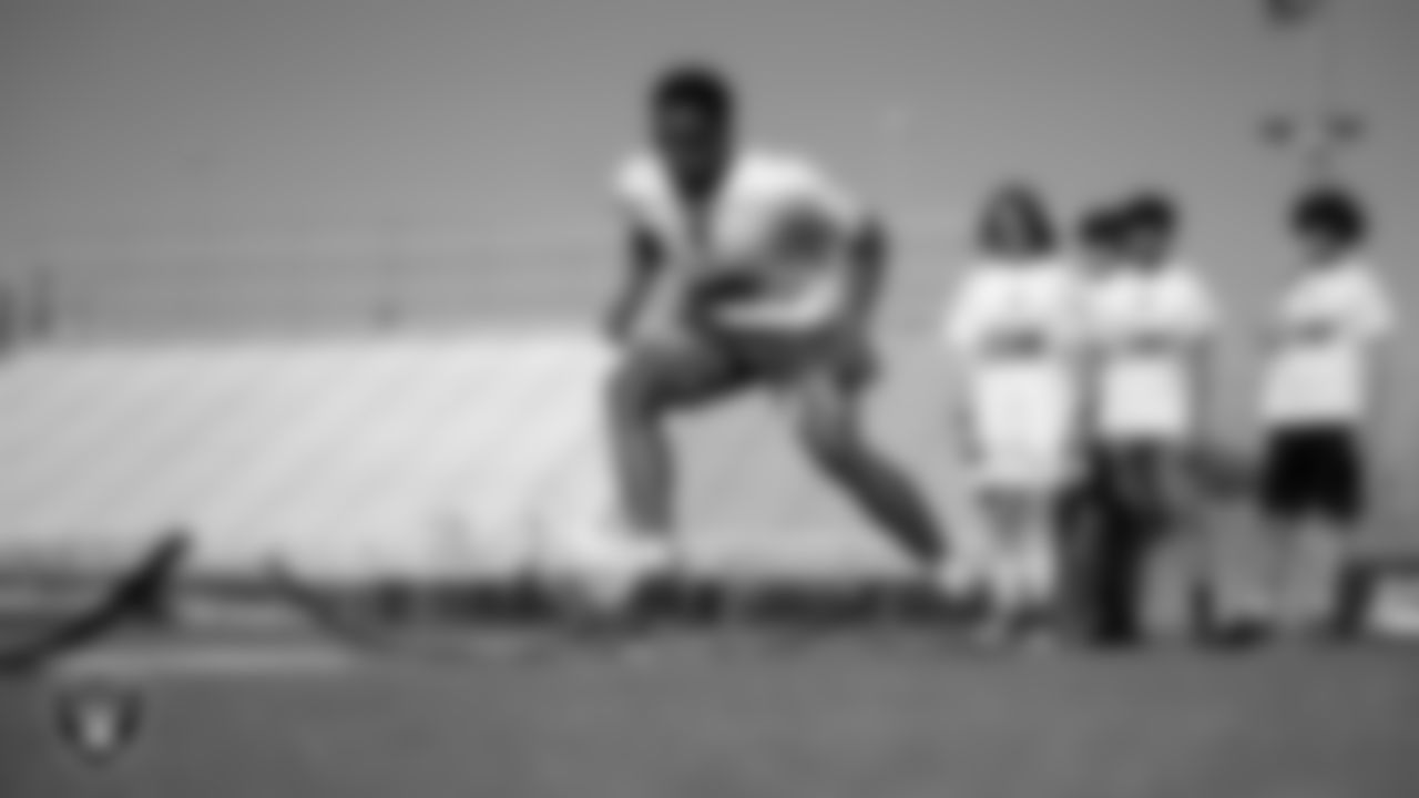 An athlete participates in a drill during a Raiders Prospect Camp at Bonanza High School.