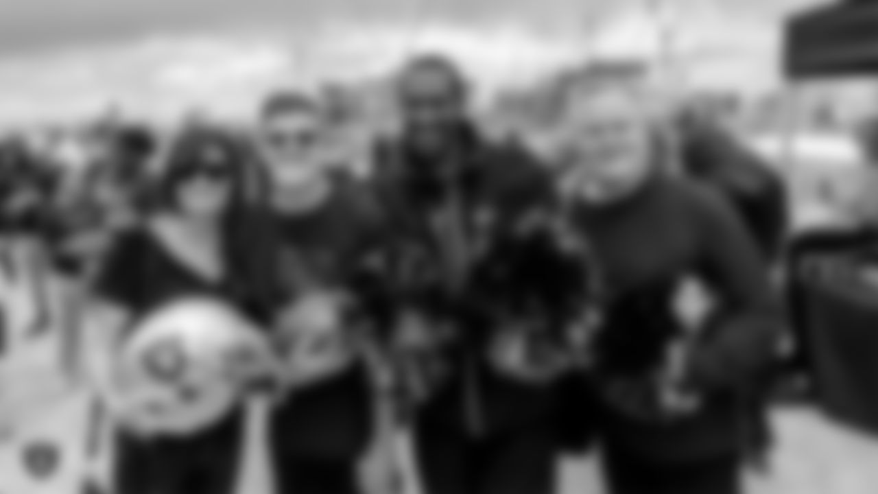 The Southern Nevada Law Enforcement Torch Run partners with the Raiders, represented by alumni Jerry Robinson and Steve Wisniewski, and the Raiderettes, to support Special Olympics Nevada by spending time with its runners and athletes at a fun-filled pit stop along the run.