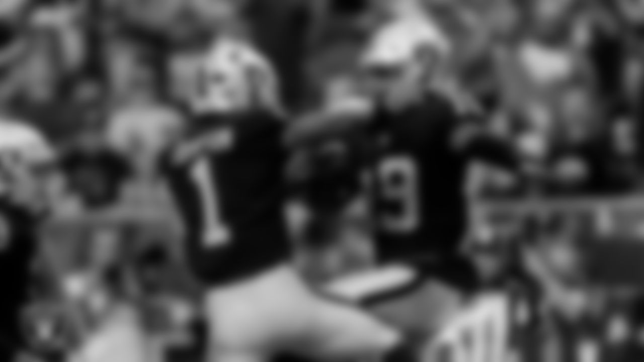 Las Vegas Raiders wide receiver DJ Turner (19) celebrates with wide receiver Tyron Johnson (1) after making a 34-yard touchdown catch during the preseason home game against the Minnesota Vikings at Allegiant Stadium.
