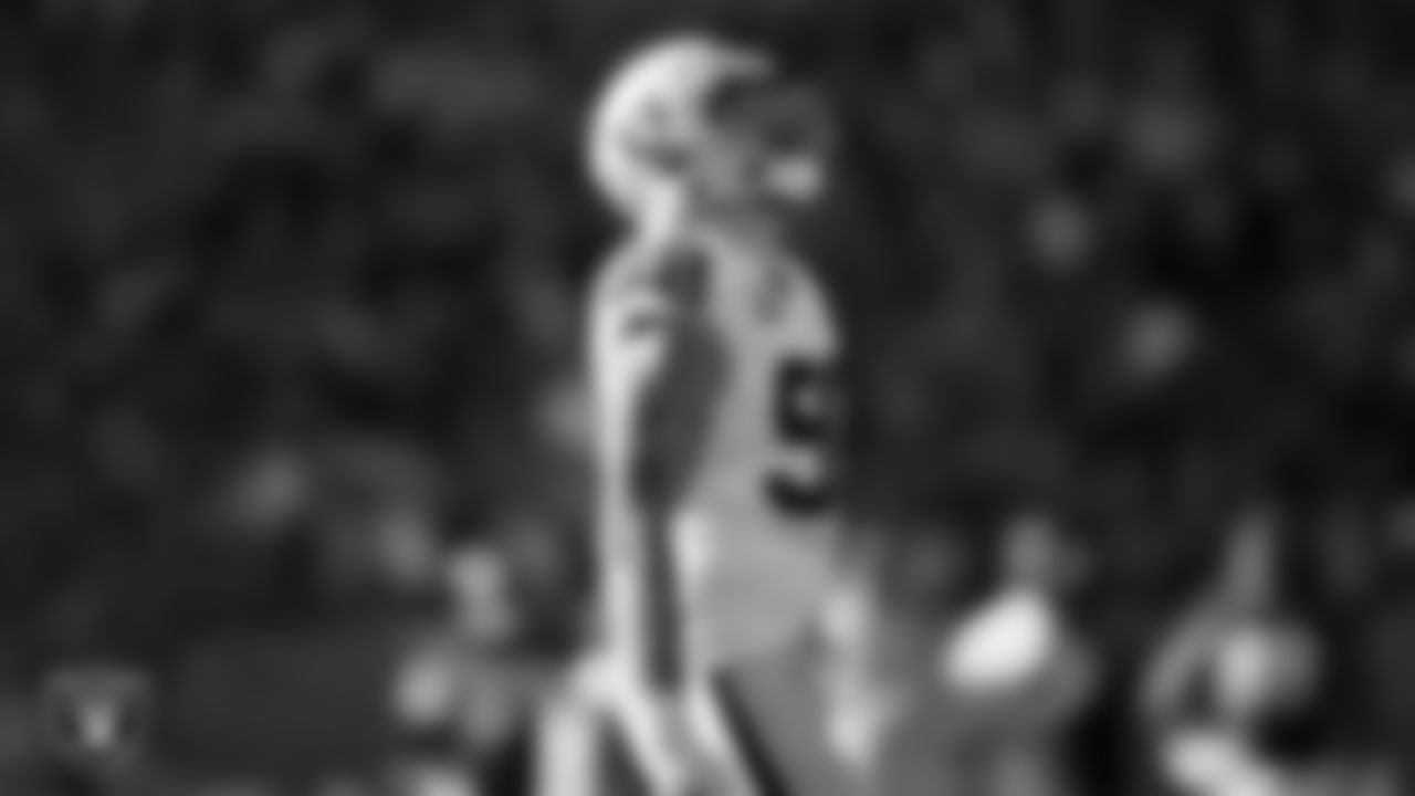 Las Vegas Raiders defensive end Maxx Crosby (98) celebrates after sacking the quarterback during the regular season away game against the Denver Broncos.