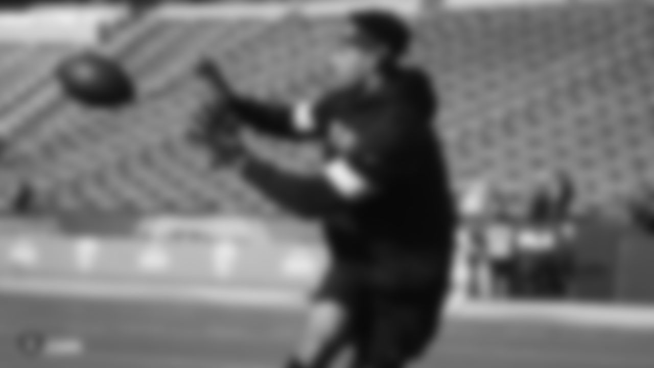 The Raiders warm up before the regular season game against the Los Angeles Chargers at ROKiT Field at Dignity Health Sports Park.