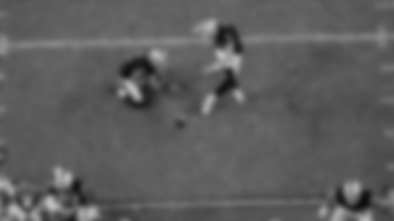 Las Vegas Raiders kicker Daniel Carlson (2) kicks a PAT during the regular season game against the Denver Broncos at Allegiant Stadium.
