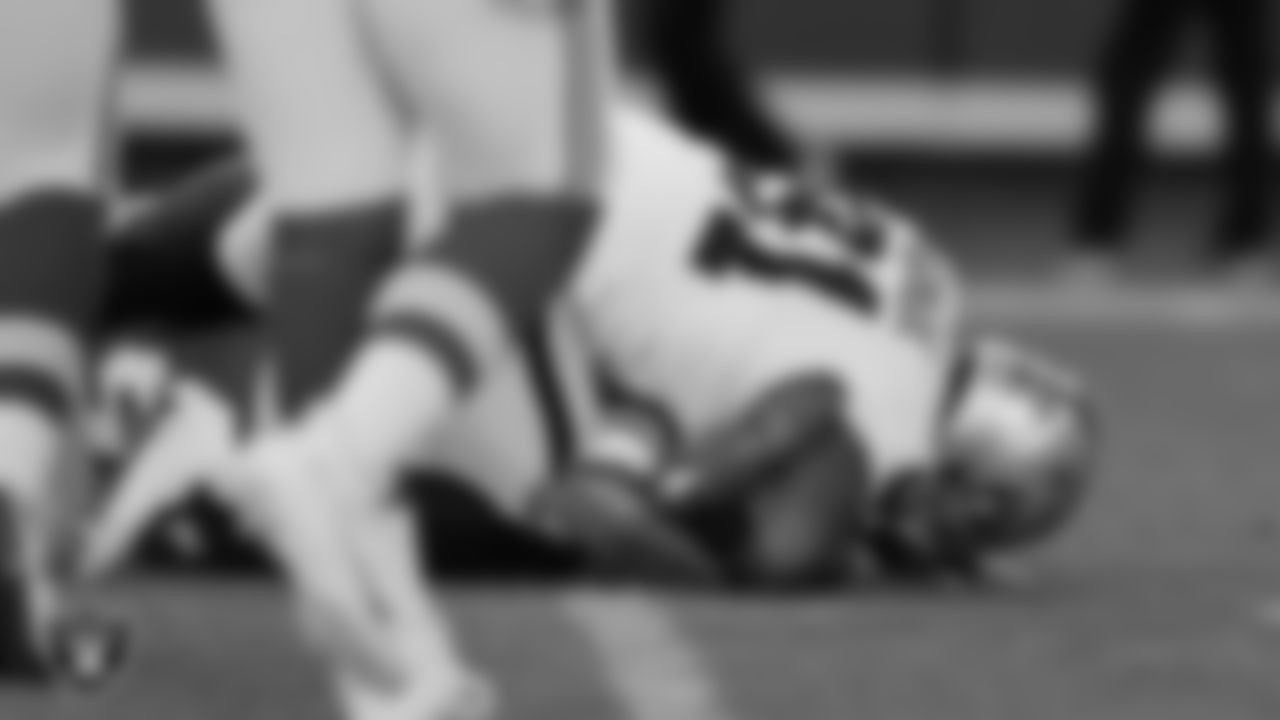 Las Vegas Raiders defensive end Yannick Ngakoue (91) sacks the quarterback during the regular season away game against the Kansas City Chiefs.
