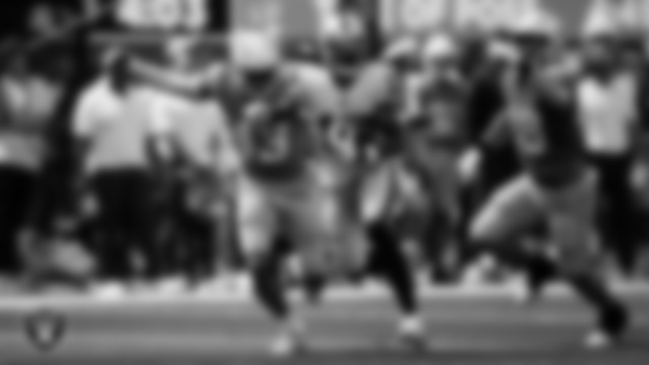 Las Vegas Raiders wide receiver Davante Adams (17) runs after making a catch during the regular season away game against the Los Angeles Chargers at SoFi Stadium.
