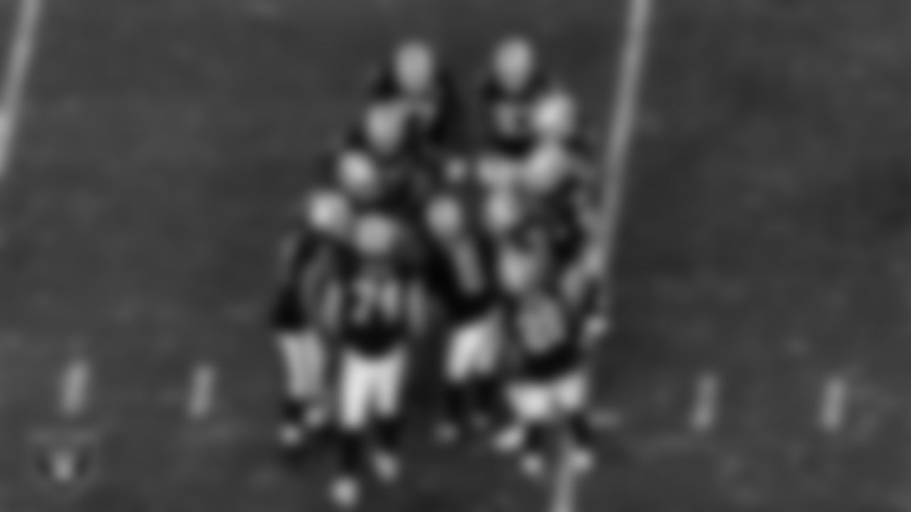 Las Vegas Raiders quarterback Marcus Mariota (8) calls a play in the huddle during the regular season home game against the Los Angeles Chargers.