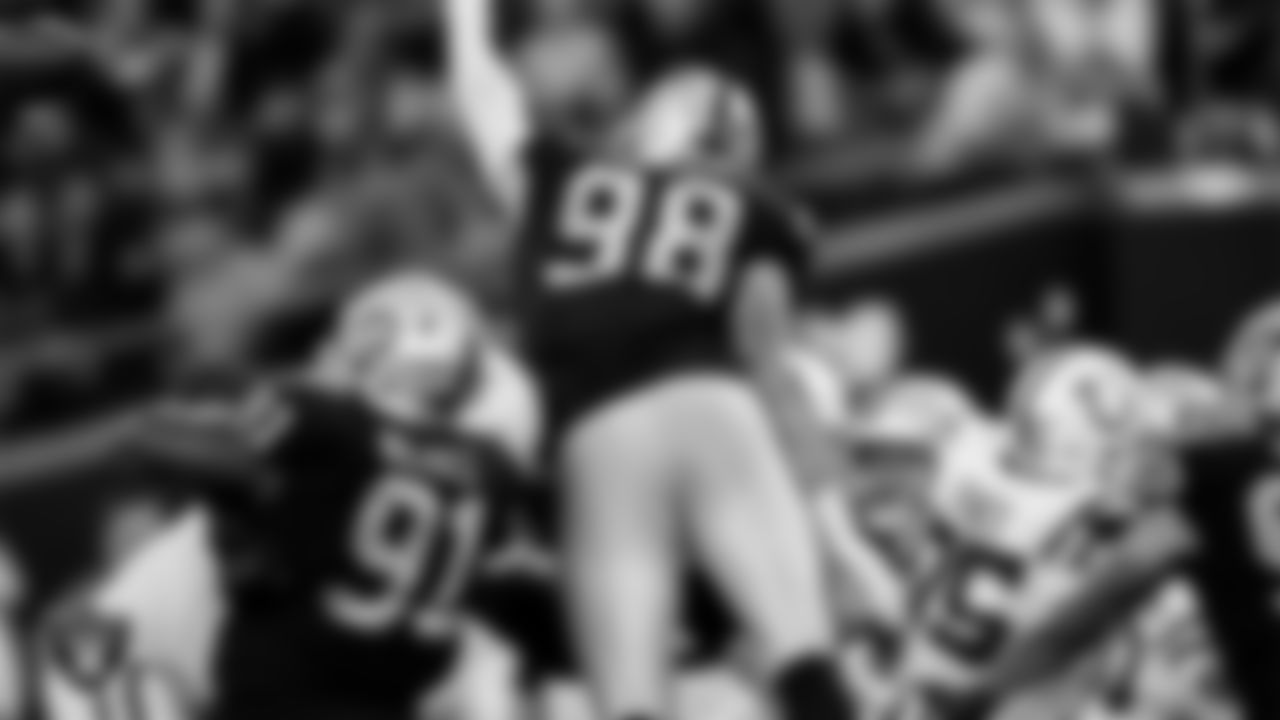 Las Vegas Raiders defensive tackle Bilal Nichols (91) and defensive end Maxx Crosby (98) during the regular season home game against the Indianapolis Colts at Allegiant Stadium.