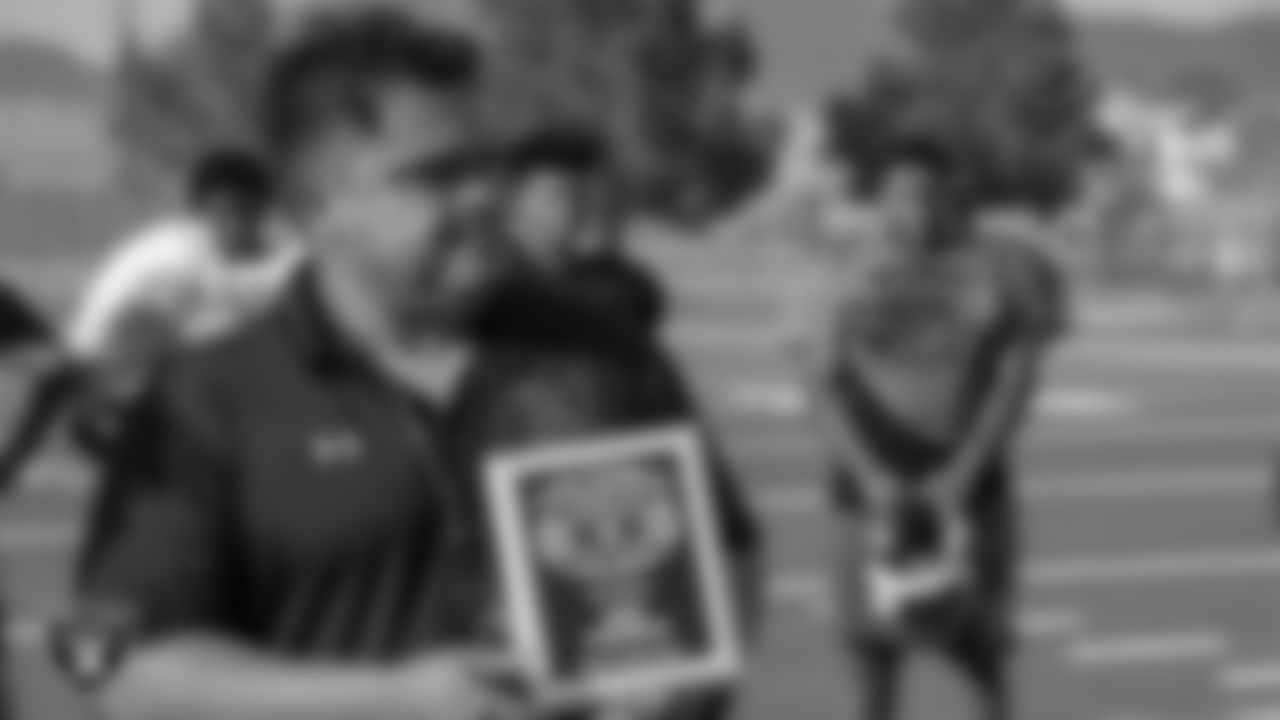 Mojave High School's football coach Wes Pacheco is awarded the Tom Flores High School Coach of the Week award.