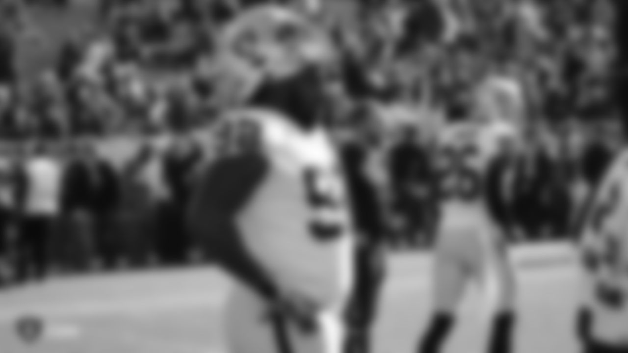 Raiders defensive tackle P.J. Hall (92) warms up before the regular season game against the Green Bay Packers at Lambeau Field.