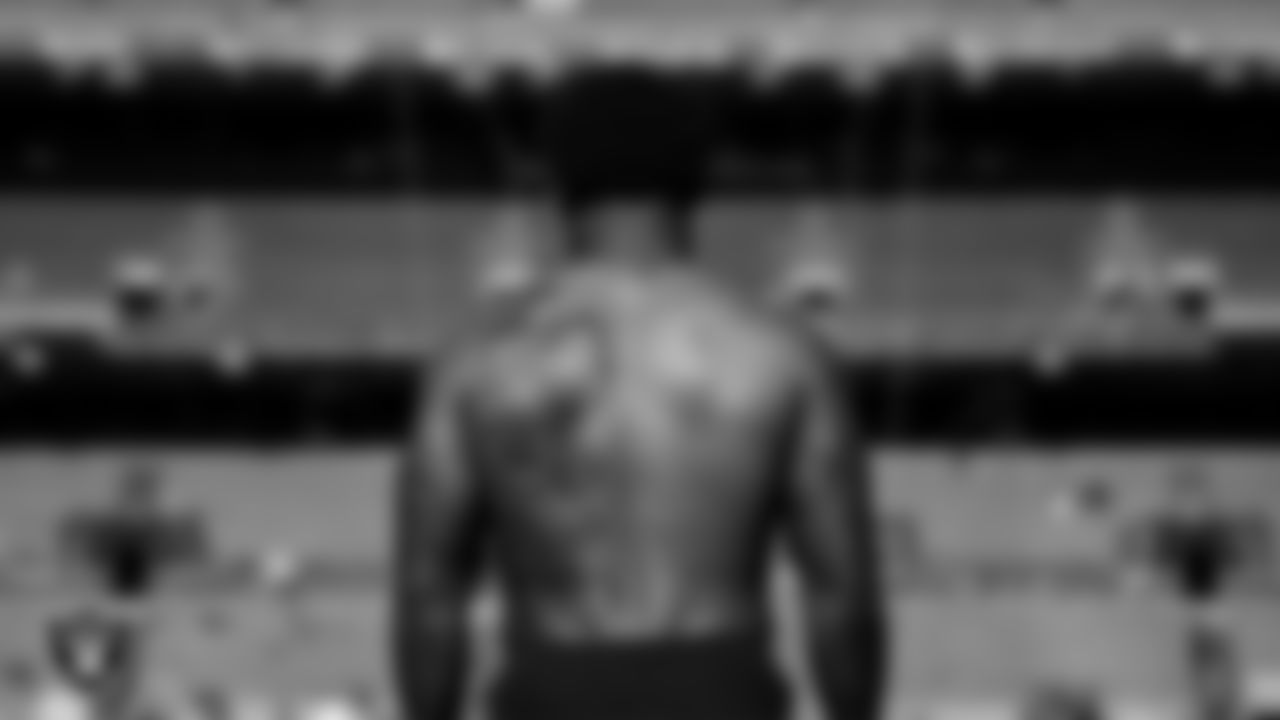 Las Vegas Raiders running back Josh Jacobs (28) warming up before the regular season away game against the Denver Broncos at Empower Field at Mile High.