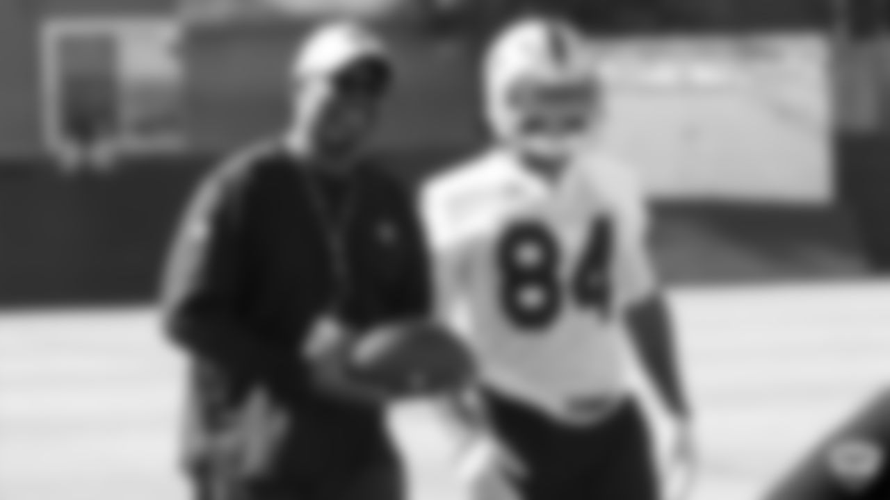 Raiders wide receivers coach Edgar Bennett and wide receiver Antonio Brown (84) on the field for practice at 2019 Training Camp.