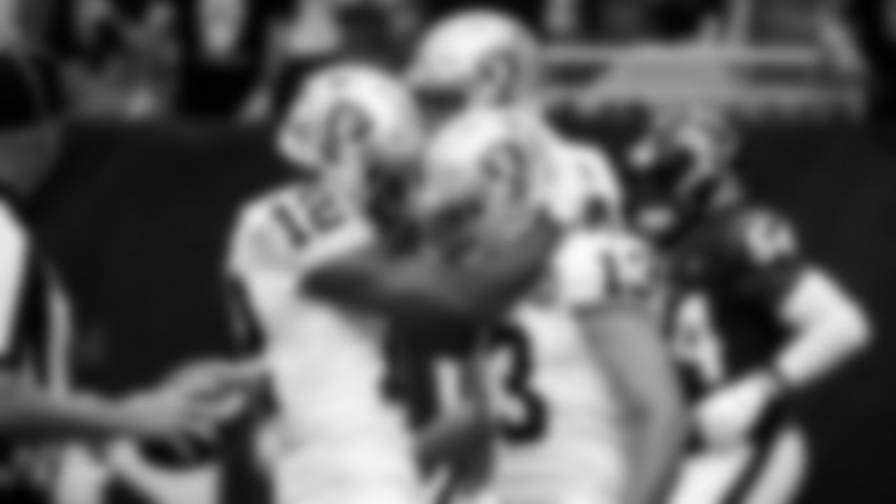Raiders wide receiver Zay Jones (12) and wide receiver Hunter Renfrow (13) celebrate after Renfrow's 65-yard touchdown reception during the regular season game against the Houston Texans.