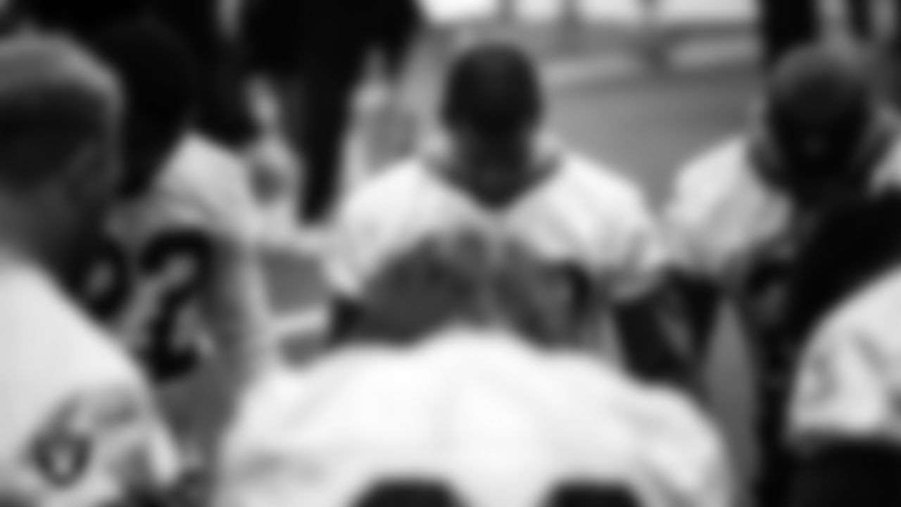 Las Vegas Raiders safety Lamarcus Joyner (29) huddles during practice.