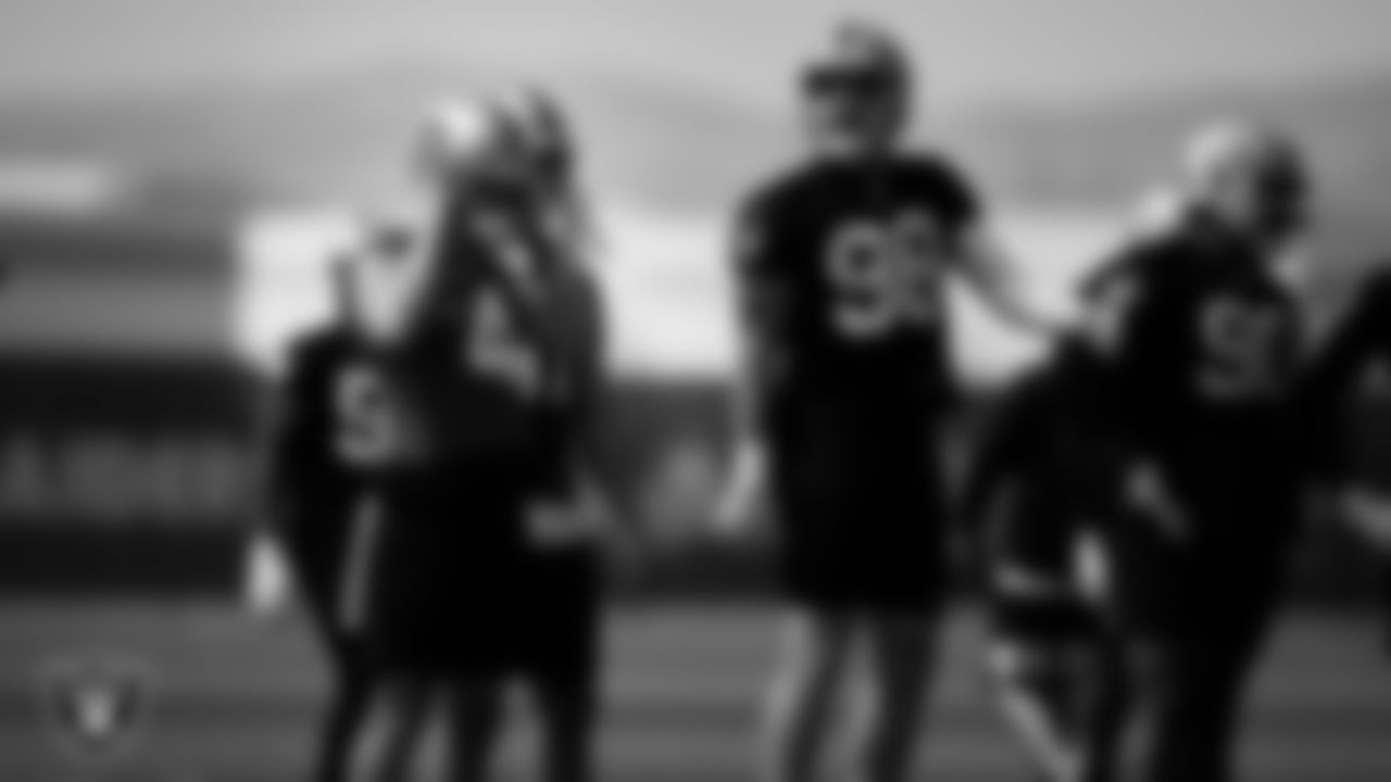 Las Vegas Raiders quarterback Derek Carr (4) and defensive end Maxx Crosby (98) during Day Two of 2022 Veteran Minicamp.