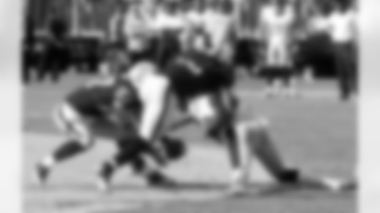FS Matt Giordano nearly recovers the fumble.