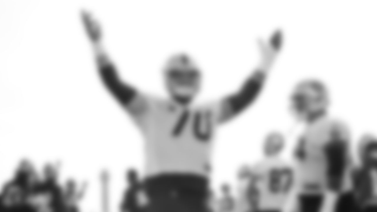 Raiders offensive lineman Kyle Kalis (70) celebrates during practice.