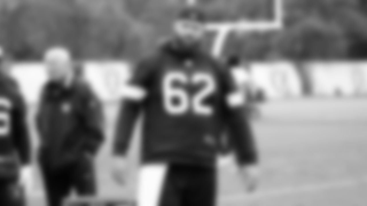 Raiders center Erik Magnuson (62) stands on the field during a walkthrough.