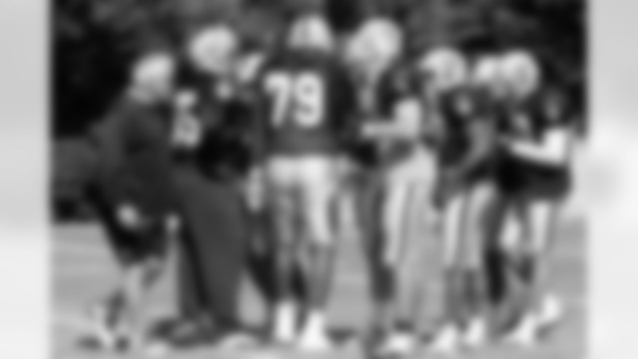 Defensive coordinator Chuck Bresnahan works with the defense.