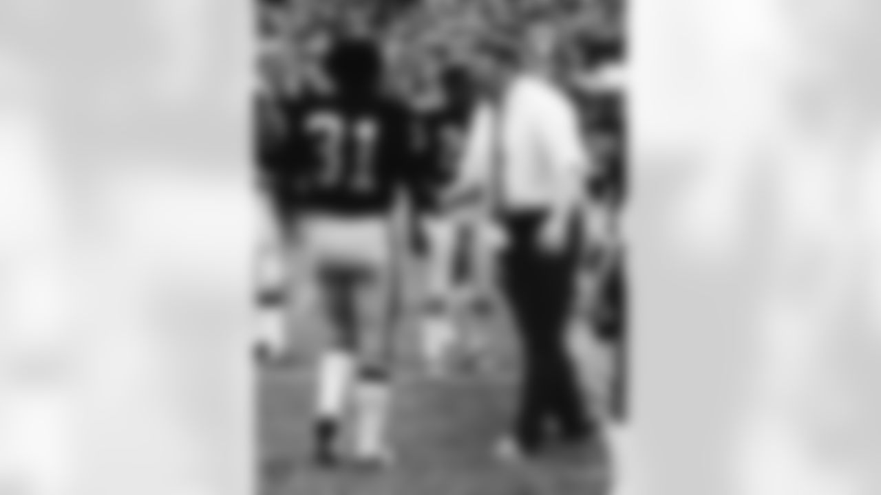 John Madden coached the Raiders to a 103-32-7 record from 1969-1978. During that time, he won five straight AFC West titles and coached the team to victory in Super Bowl XI.