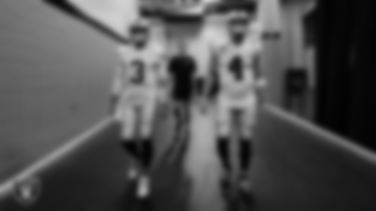 Las Vegas Raiders quarterback Jarrett Stidham (3), quarterback Chase Garbers (15) and quarterback Derek Carr (4) walk down the tunnel before the regular season away game against the New Orleans Saints at Caesars Superdome.
