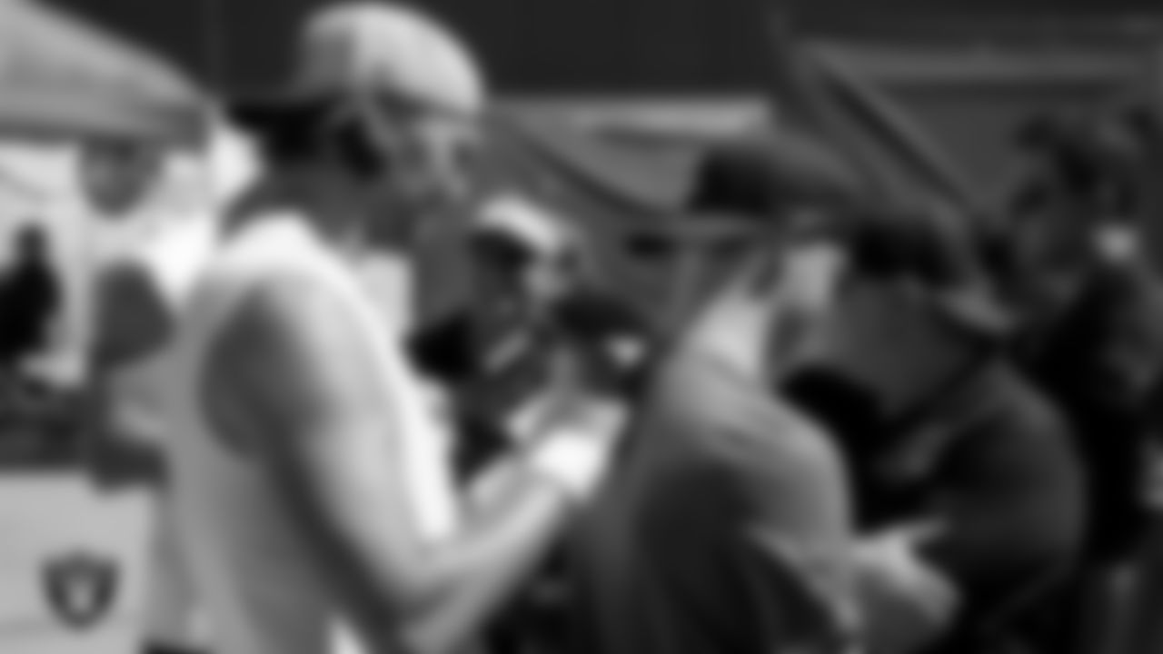 Las Vegas Raiders punter AJ Cole (6) signs autographs for fans after practice at 2023 Training Camp at Intermountain Health Performance Center.