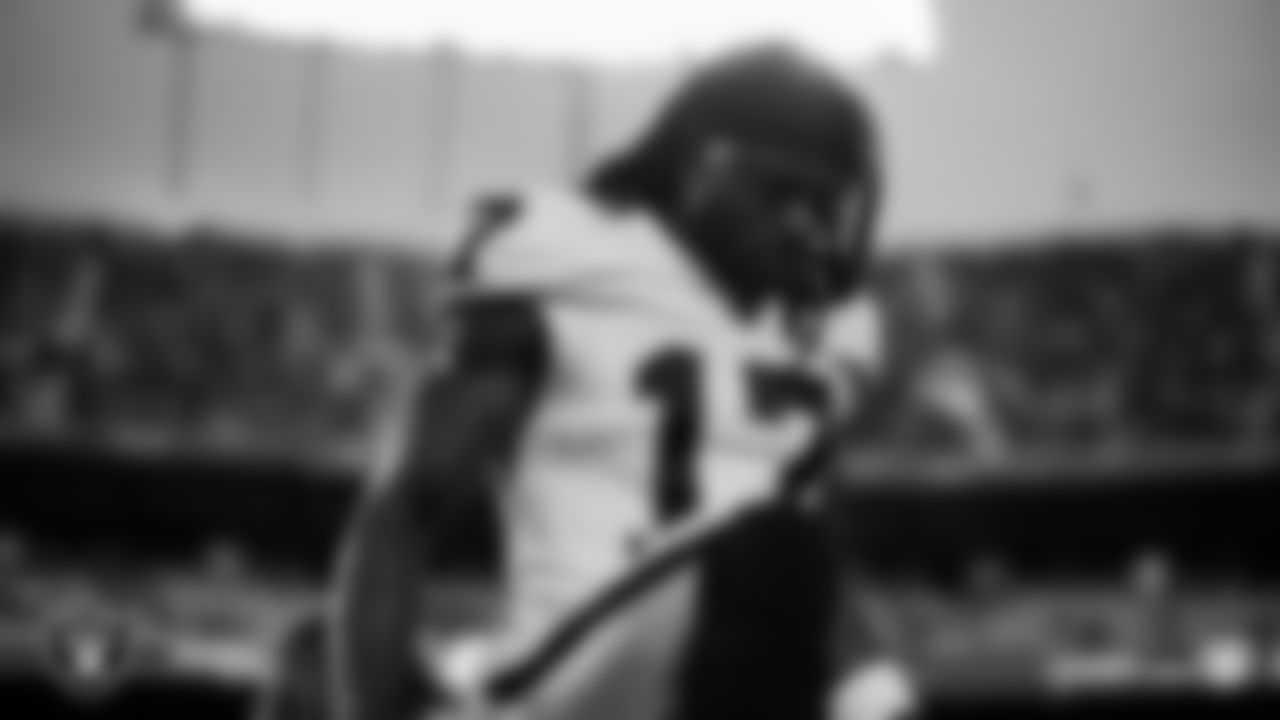 Las Vegas Raiders wide receiver Davante Adams (17) warming up before the regular season away game against the Kansas City Chiefs at GEHA Field at Arrowhead Stadium.