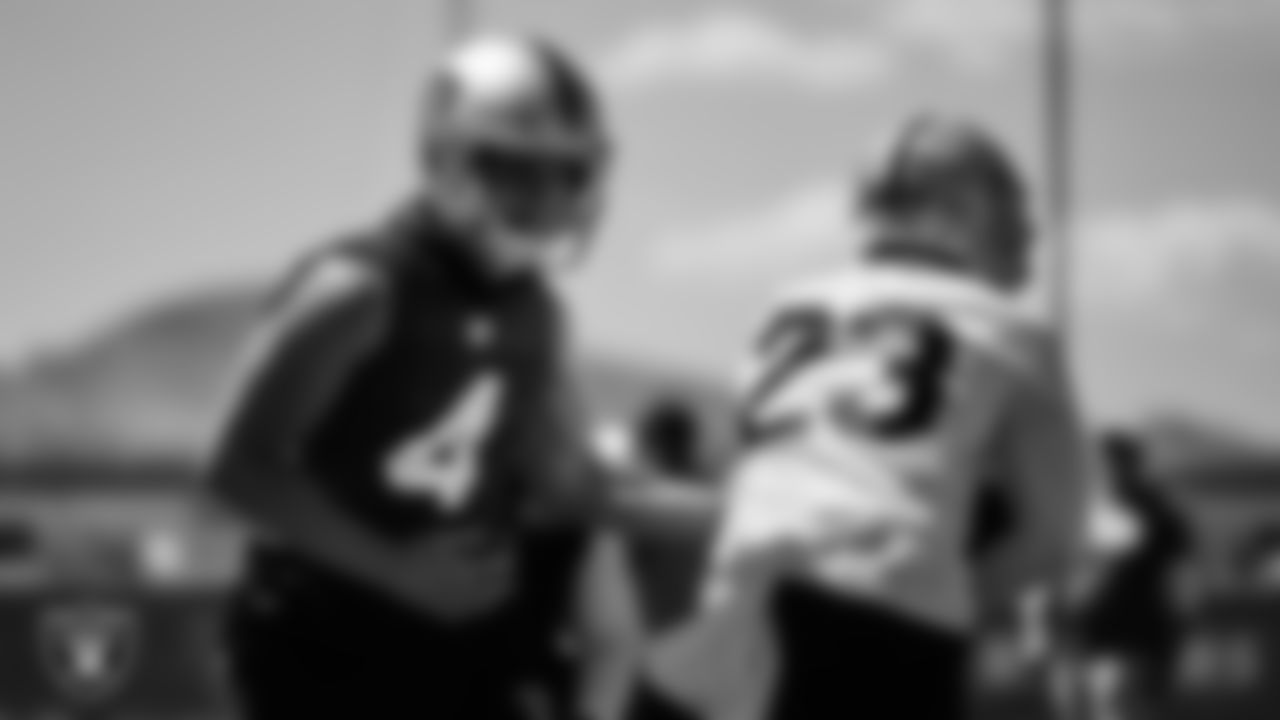 Las Vegas Raiders quarterback Derek Carr (4) and running back Kenyan Drake at an Organized Team Activity (OTA).