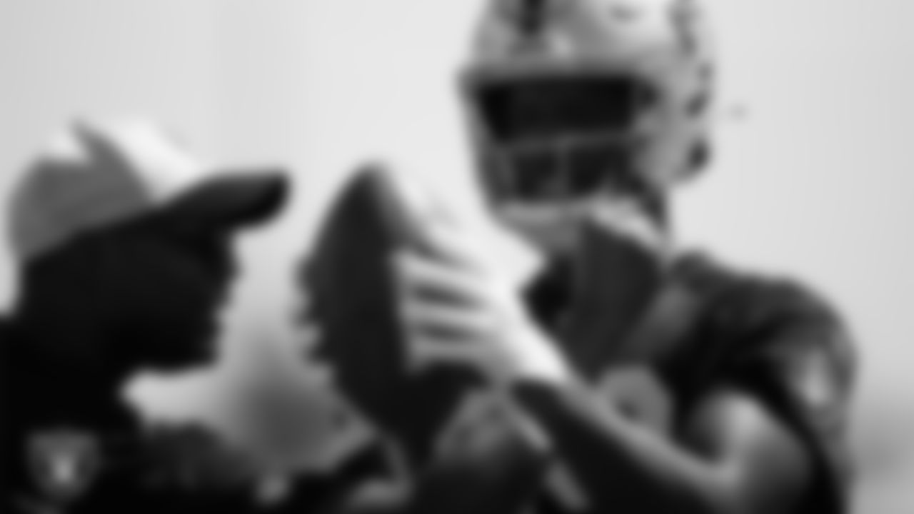 Las Vegas Raiders wide receivers coach Edgar Bennett and wide receiver Bryan Edwards (89) during practice at Intermountain Healthcare Performance Center.