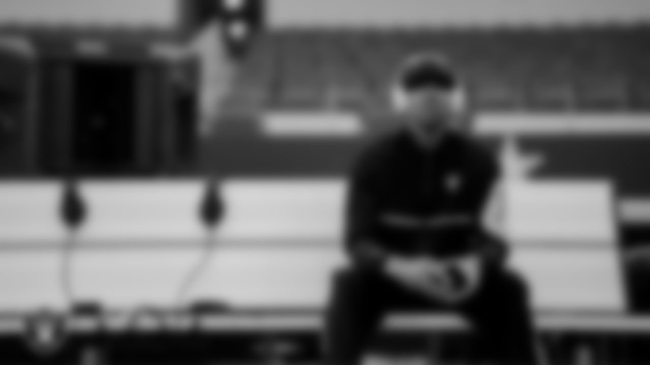 Las Vegas Raiders defensive line coach Rob Leonard on the bench before the preseason away game against the Dallas Cowboys at AT&T Stadium.