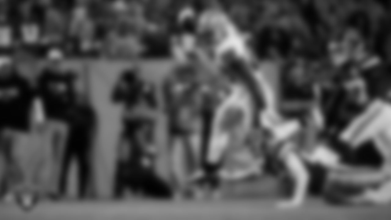 Las Vegas Raiders running back Josh Jacobs (28) rushes during the regular season away game against the Kansas City Chiefs at GEHA Field at Arrowhead Stadium.