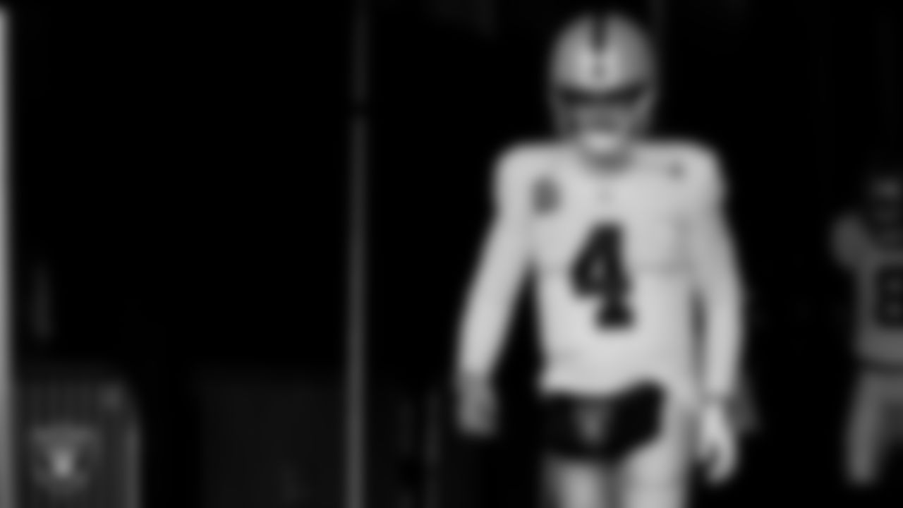 Las Vegas Raiders quarterback Derek Carr (4) walks down the tunnel before the postseason away game against the Cincinnati Bengals.