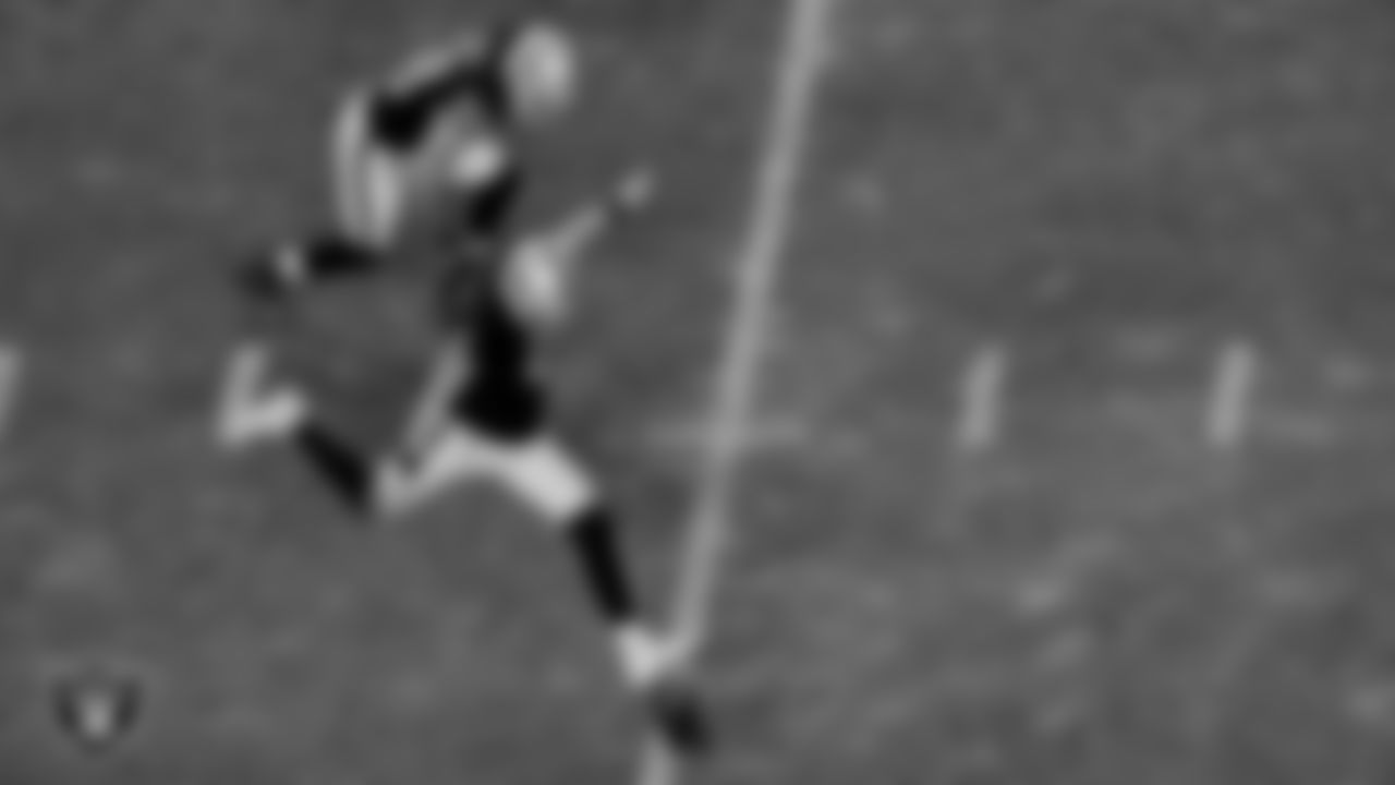 Las Vegas Raiders kicker Daniel Carlson (2) and linebacker Kyle Wilber (58) during the regular season game against the Kansas City Chiefs at Allegiant Stadium.