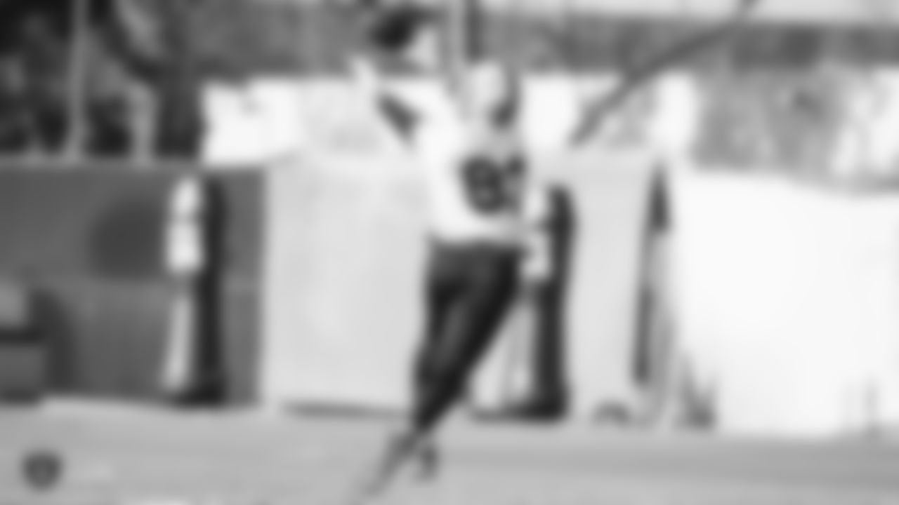 Raiders tight end Darren Waller (83) goes up for a catch during practice.