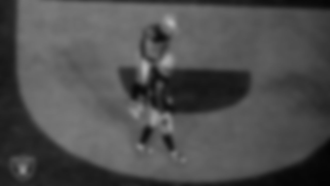 Las Vegas Raiders wide receiver Jakobi Meyers (16) celebrates with tight end Michael Mayer (87) after making a 9-yard touchdown catch during the regular season home game against the Green Bay Packers at Allegiant Stadium.