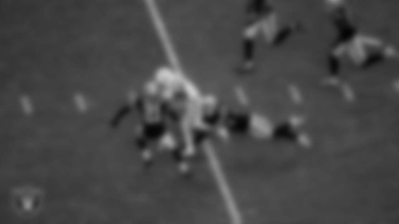 Las Vegas Raiders safety Tre'von Moehrig (25) forces a fumble during the regular season home game against the Indianapolis Colts at Allegiant Stadium.