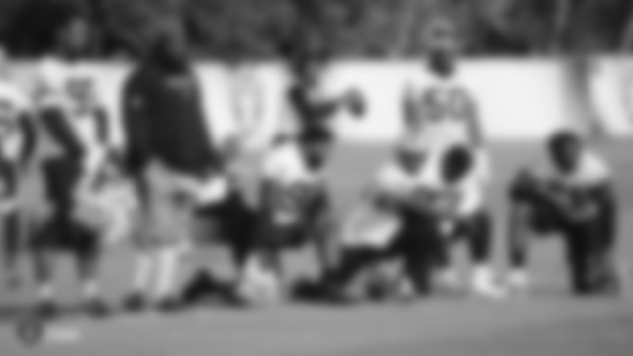 Raiders defensive end Dion Jordan (95), defensive line coach Brentson Buckner, defensive tackle Johnathan Hankins (90), defensive end Clelin Ferrell (96), defensive tackle Maurice Hurst (73), linebacker Nicholas Morrow (50) and defensive end Benson Mayowa (91) on the field during practice.
