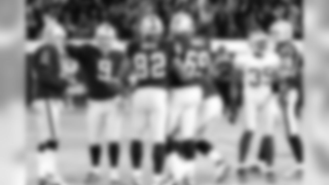 The Raiders celebrate K Sebastian Janikowski's 57-yard FG. Photo by Tony Gonzales.