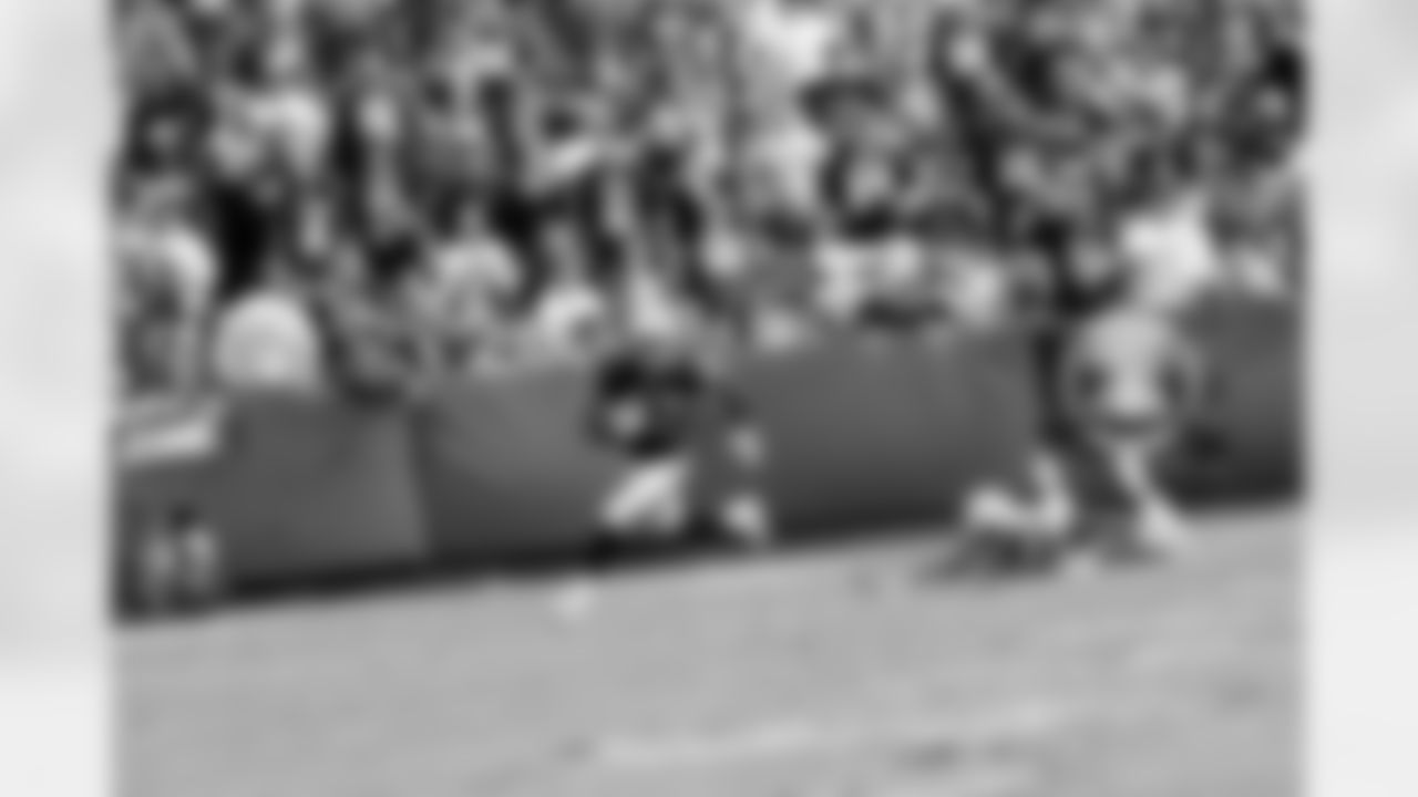 WR Denarius Moore makes the first player miss as he races up the field.