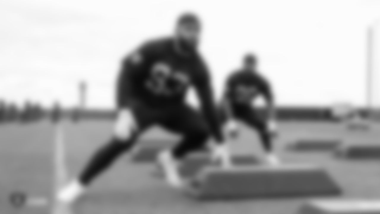 Raiders defensive ends Alex Barrett (93) and Clelin Ferrell (96) at a workout during phase two of the offseason program at the Raiders Practice Facility in Alameda, Calif.