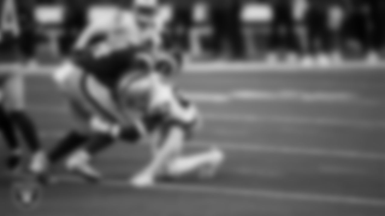Las Vegas Raiders cornerback Sam Webb (27) makes a tackle during the preseason away game against the Los Angeles Rams at Sofi Stadium.