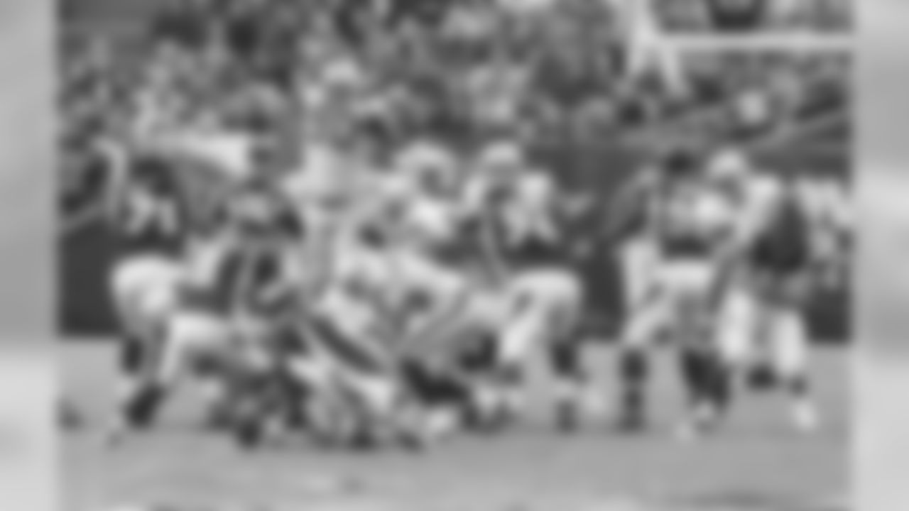 SS Tyvon Branch gets in the face of the kicker on a field goal attempt, causing the holder to pick up the ball.