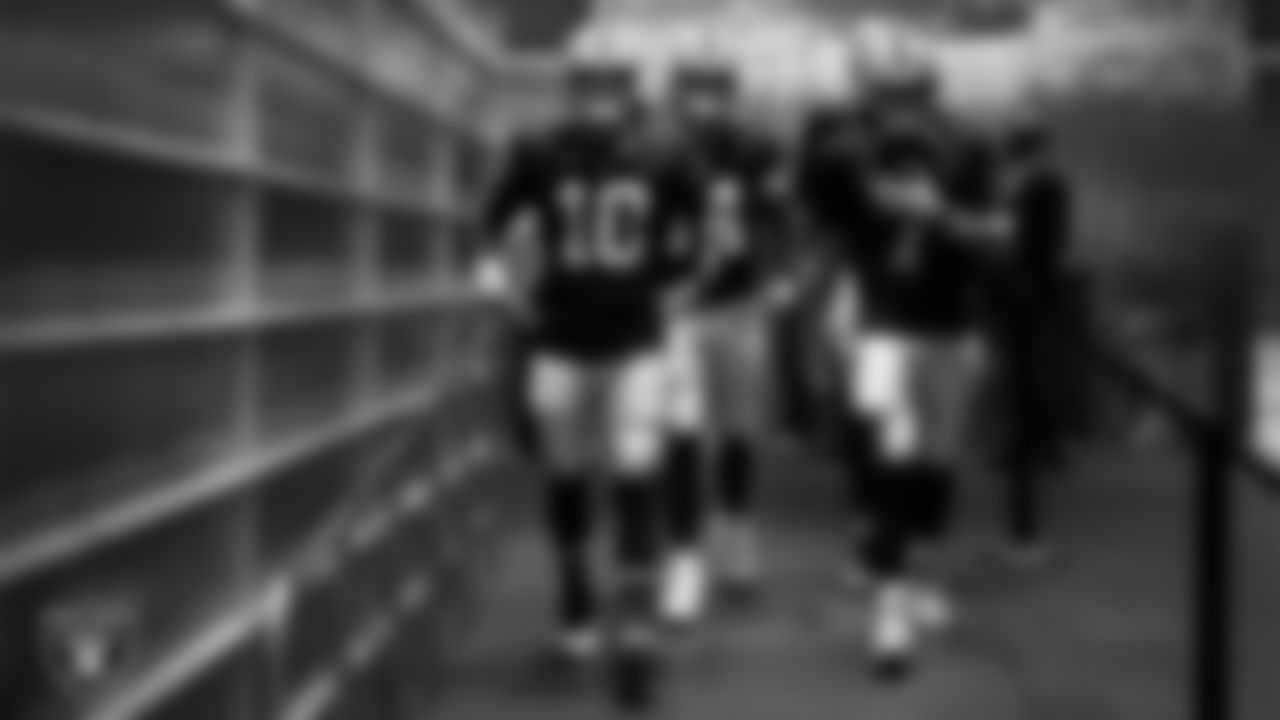 The Las Vegas Raiders quarterbacks walk down the tunnel before the preseason away game against the Dallas Cowboys at AT&T Stadium.