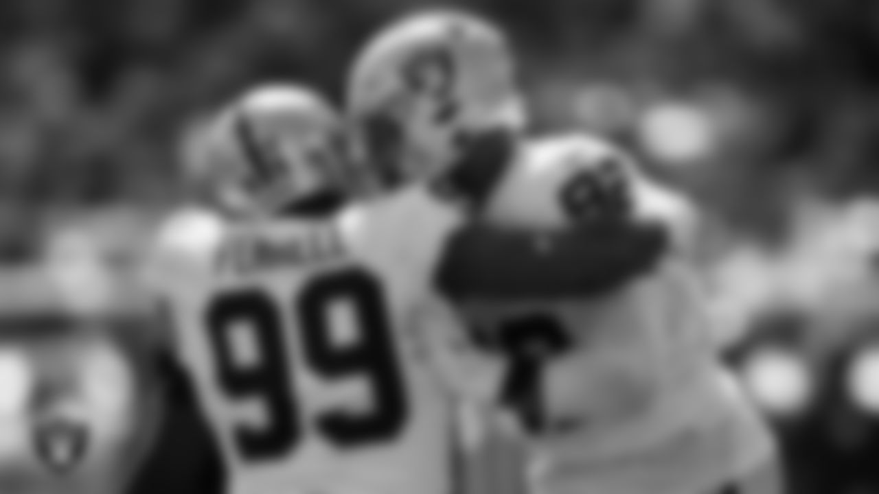 Las Vegas Raiders defensive tackle Solomon Thomas (92) is congratulated by defensive end Clelin Ferrell (99) after making a tackle during the regular season away game against the Pittsburgh Steelers.