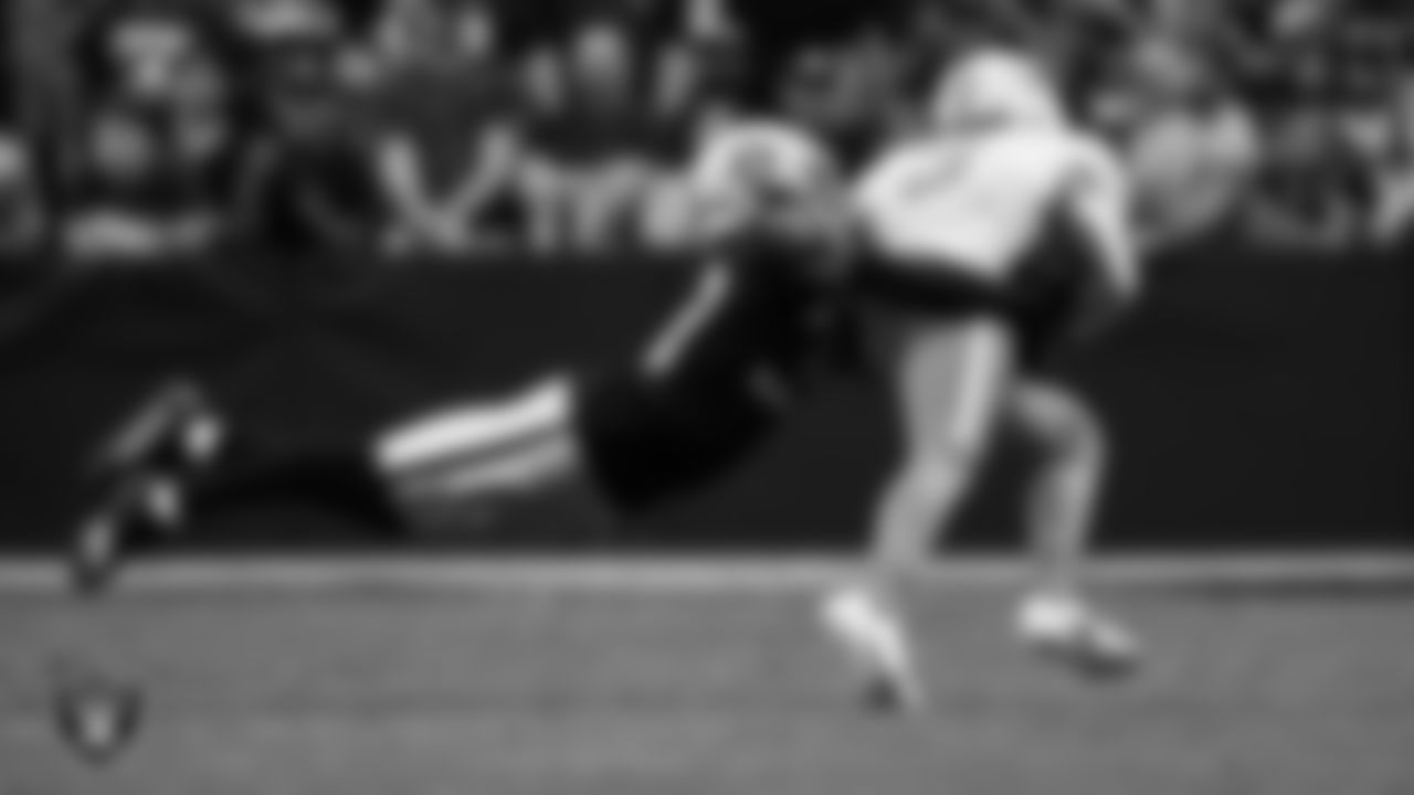 Las Vegas Raiders cornerback Nate Hobbs (39) makes a tackle during the regular season home game against the Miami Dolphins.
