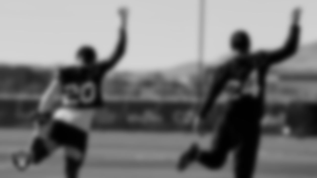 Las Vegas Raiders cornerback Darius Phillips (20) and safety Johnathan Abram (24) at a workout during phase two of the offseason program.