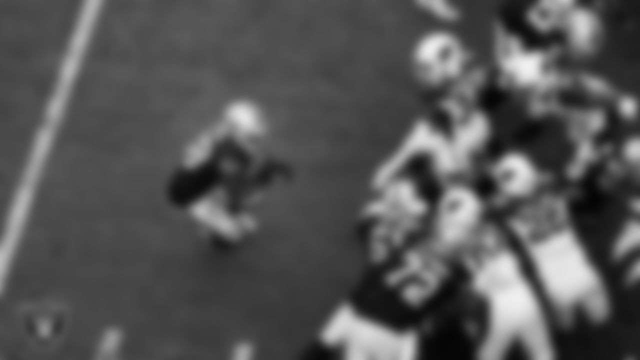 Las Vegas Raiders running back Josh Jacobs (28) rushes during the regular season home game against the Arizona Cardinals at Allegiant Stadium.