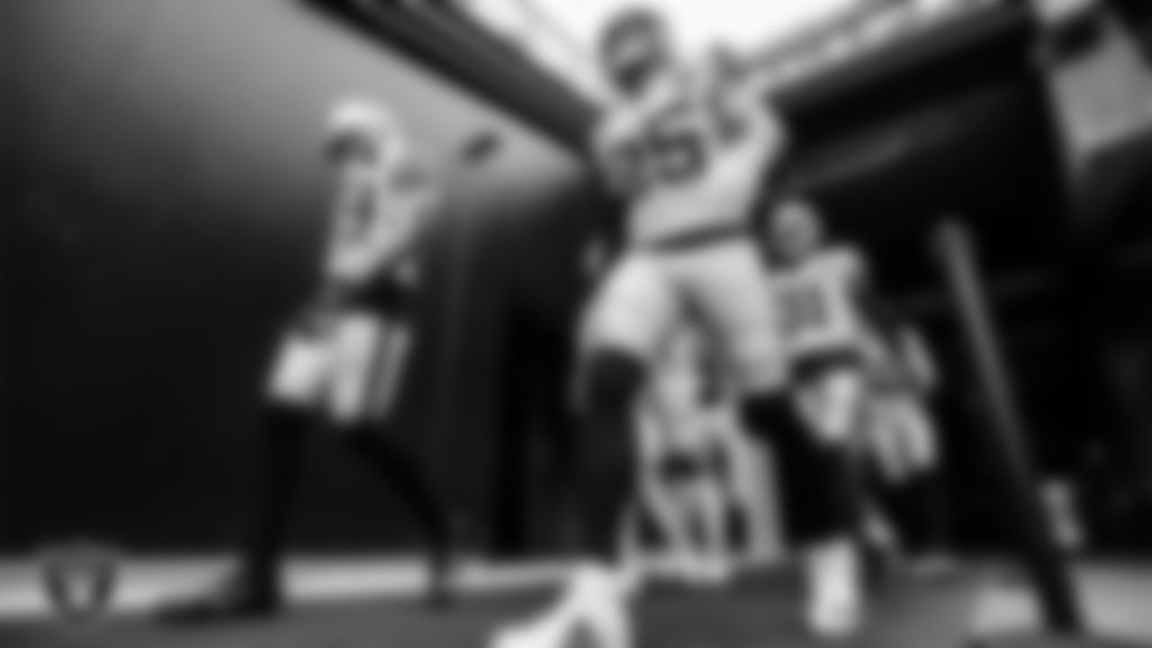 Las Vegas Raiders safety Lamarcus Joyner (29), safety Erik Harris (25) and cornerback Isaiah Johnson (31) walk down the tunnel before the regular season away game against the New England Patriots.