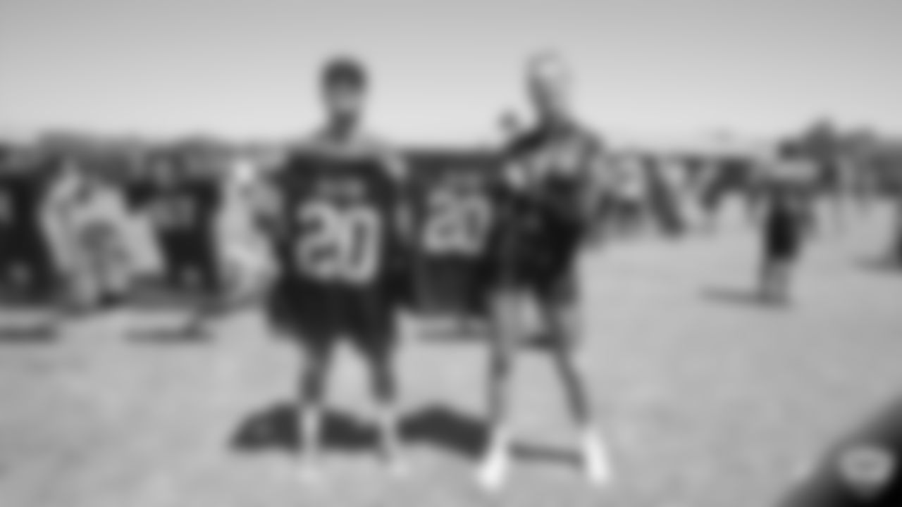 Musical artist Bohnes and model Josephine Skriver receive their honorary Raiders jerseys after practice at 2019 Training Camp.